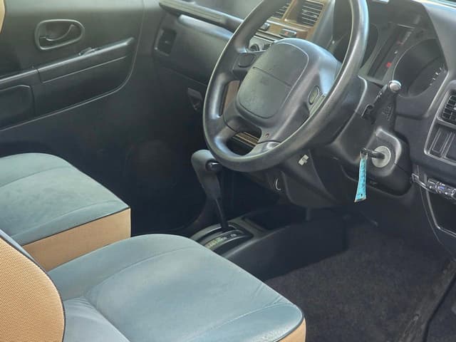 1998 Mitsubishi Pajero Mini JDM car for sale — photo 14 of 25