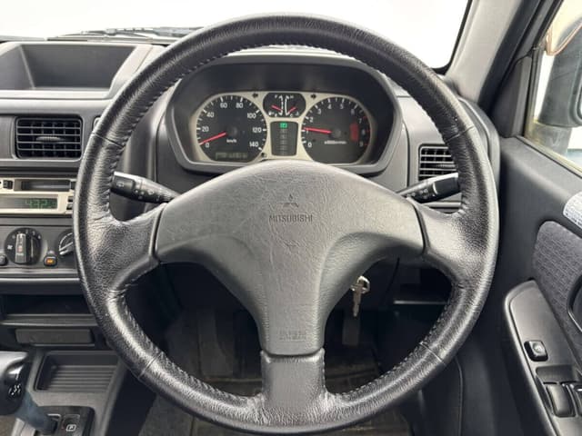 2001 Mitsubishi Pajero Mini JDM car for sale — photo 9 of 25