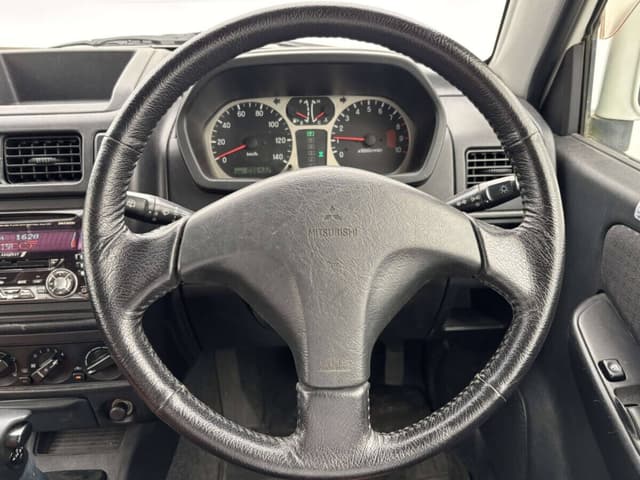 2001 Mitsubishi Pajero Mini JDM car for sale — photo 9 of 25