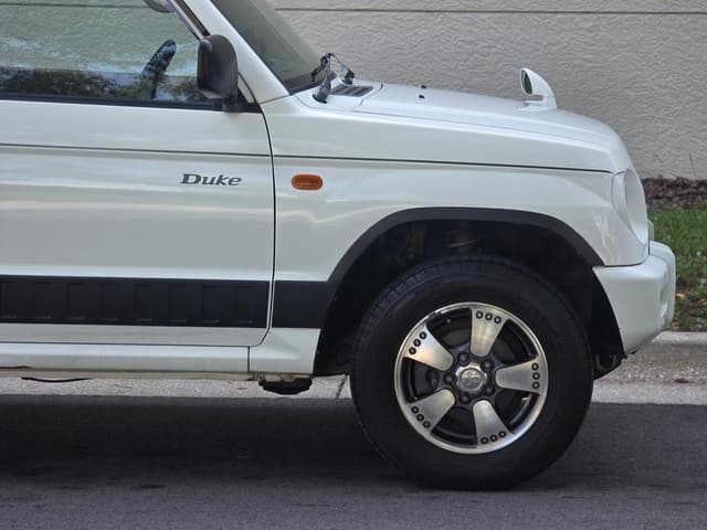 1998 Mitsubishi Pajero Mini JDM car for sale — photo 3 of 25